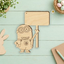 Minion με ταμπέλα